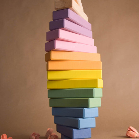 Product photo of Pastel Bricks Set, a pastel-colored wooden wooden rainbow stacker set.