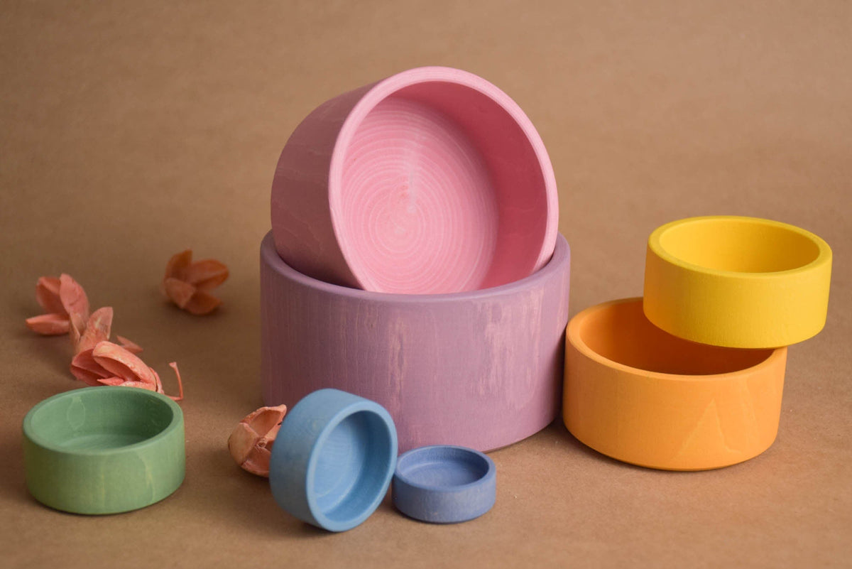 Pastel-colored linden wood stacking cups