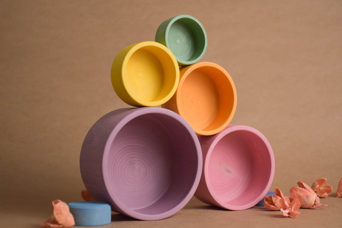 Pastel wooden nesting bowls made of linden wood