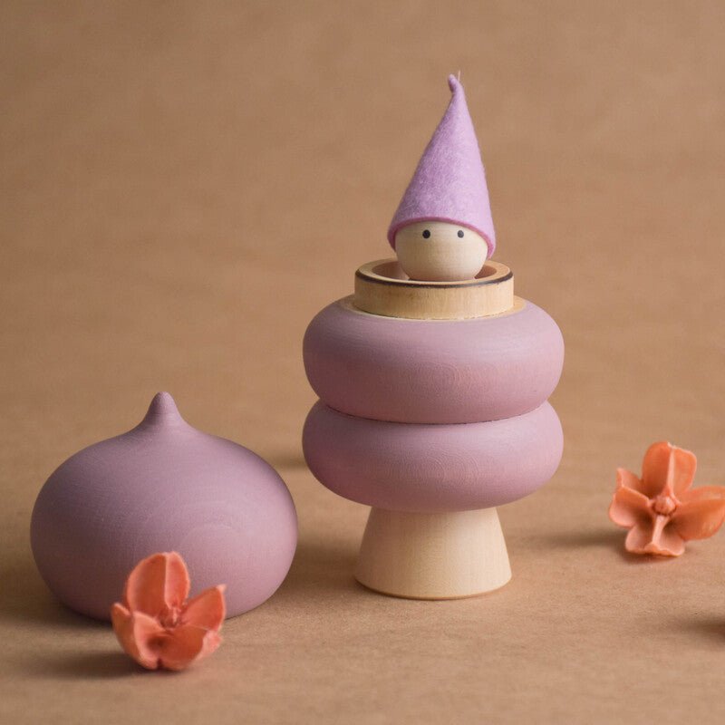 Pink wooden opening tree with peg doll figure