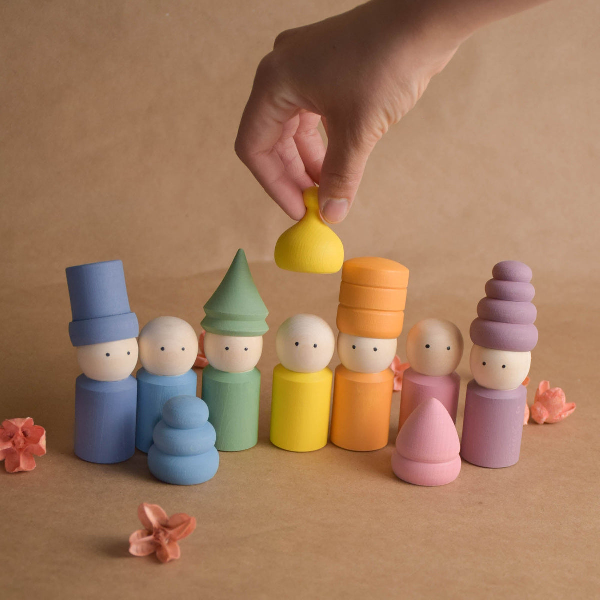 Pastel-hat wooden peg doll figures