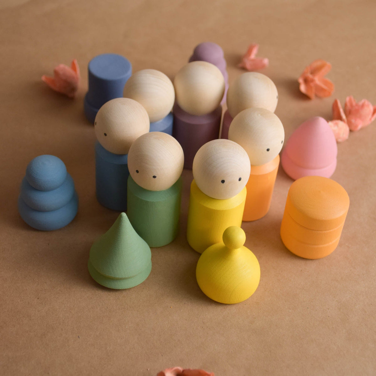 Pastel peg doll family with opening hats