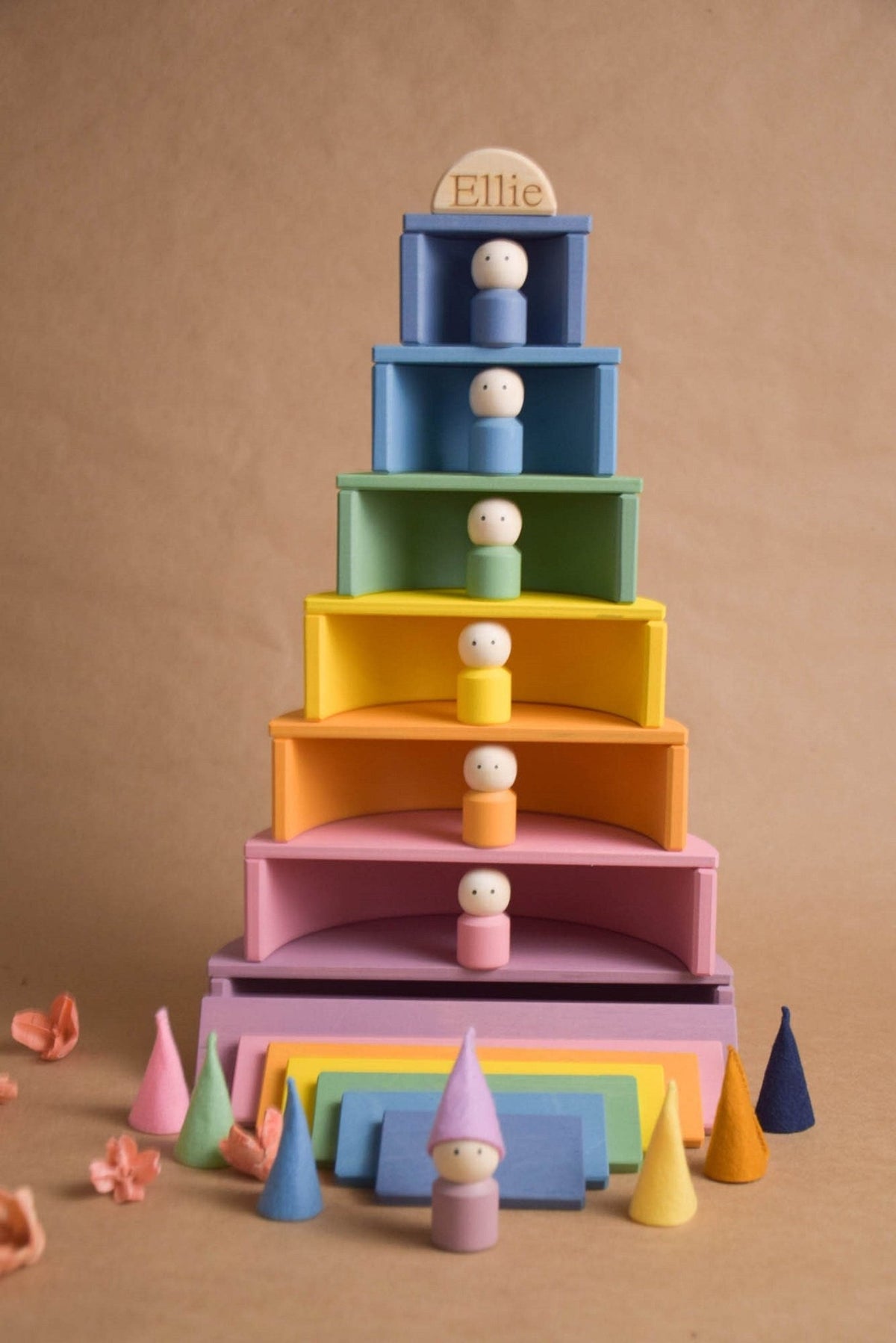 Handmade Montessori pastel rainbow building toy in wood and plywood with a natural wax-and-oil finish