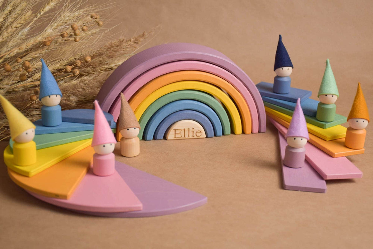 Handmade Montessori pastel rainbow building toy in wood and plywood with a natural wax-and-oil finish