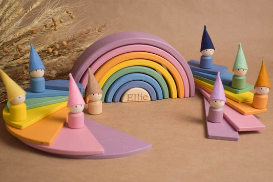 Handmade Montessori pastel rainbow building toy in wood and plywood with a natural wax-and-oil finish