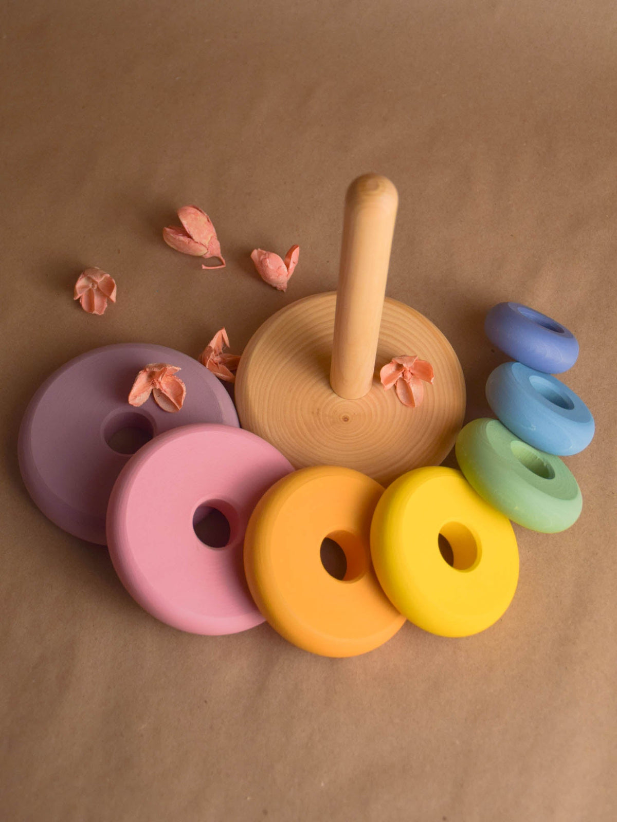 Linden wood stacking rings toy with pastel-colored turned rings
