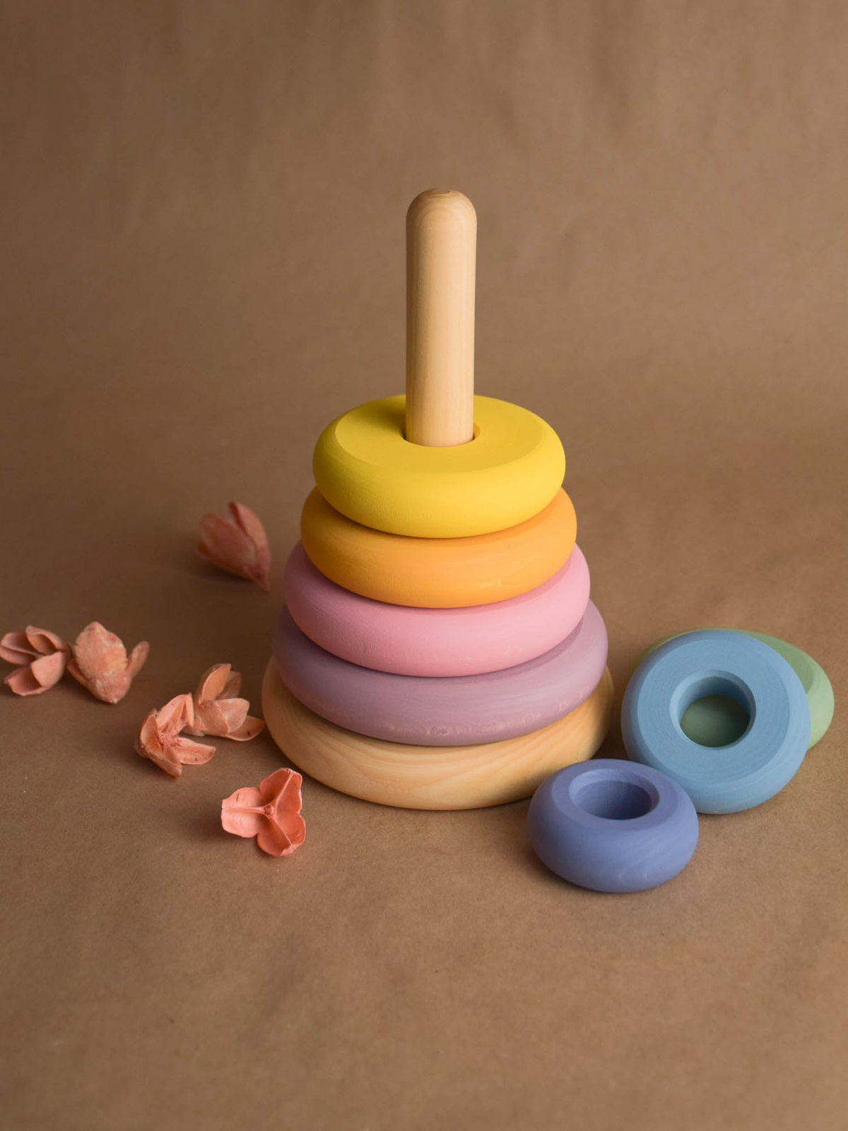 Linden wood ring stacker with pastel-colored turned rings