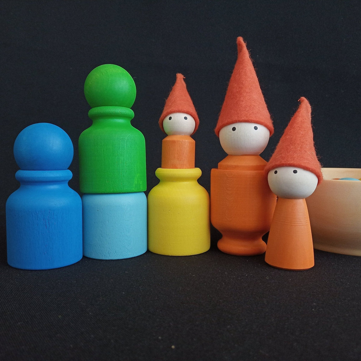 Linden wood mom, dad, and child peg dolls