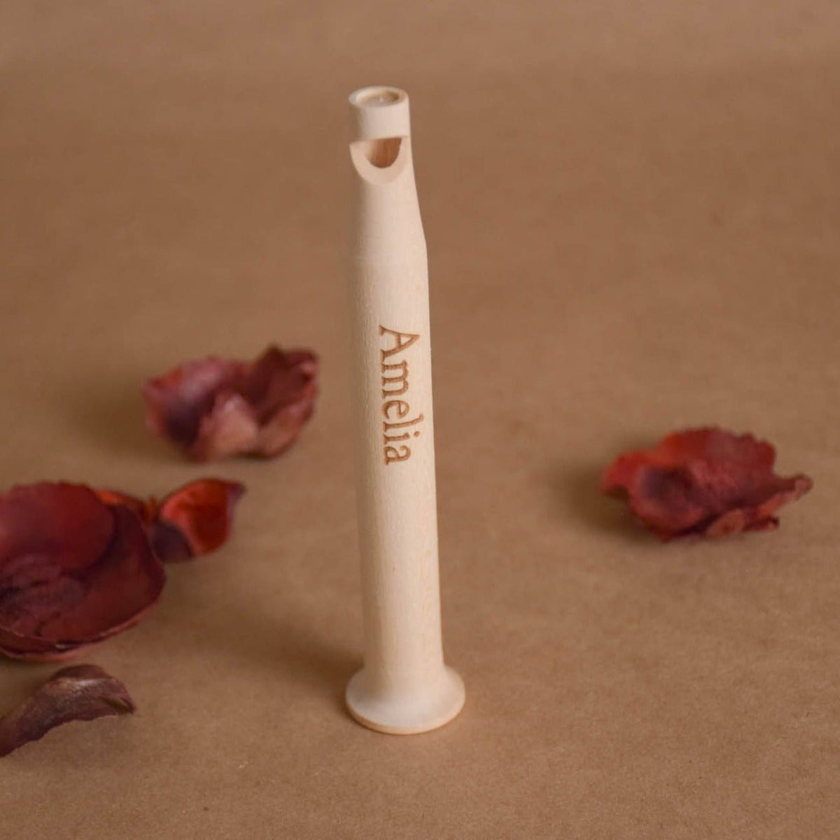 Wooden pull whistle toy made from linden wood