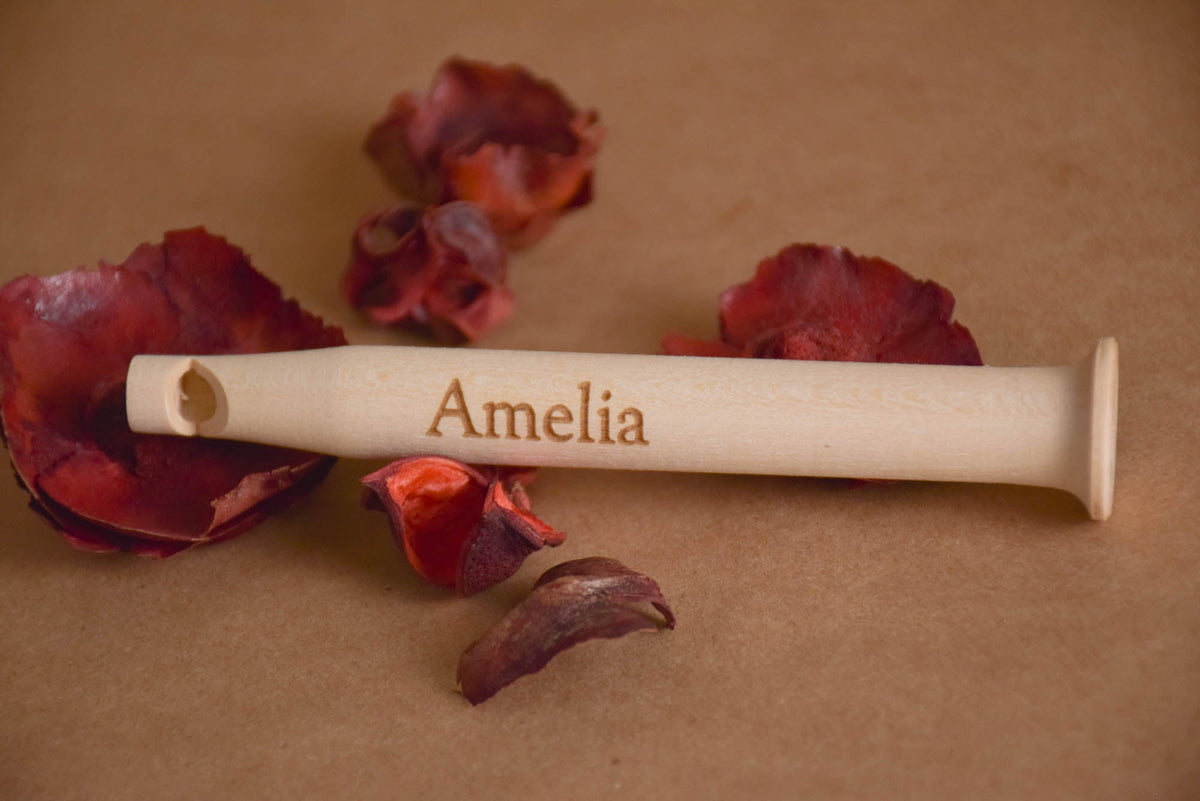 Wooden pull whistle musical toy