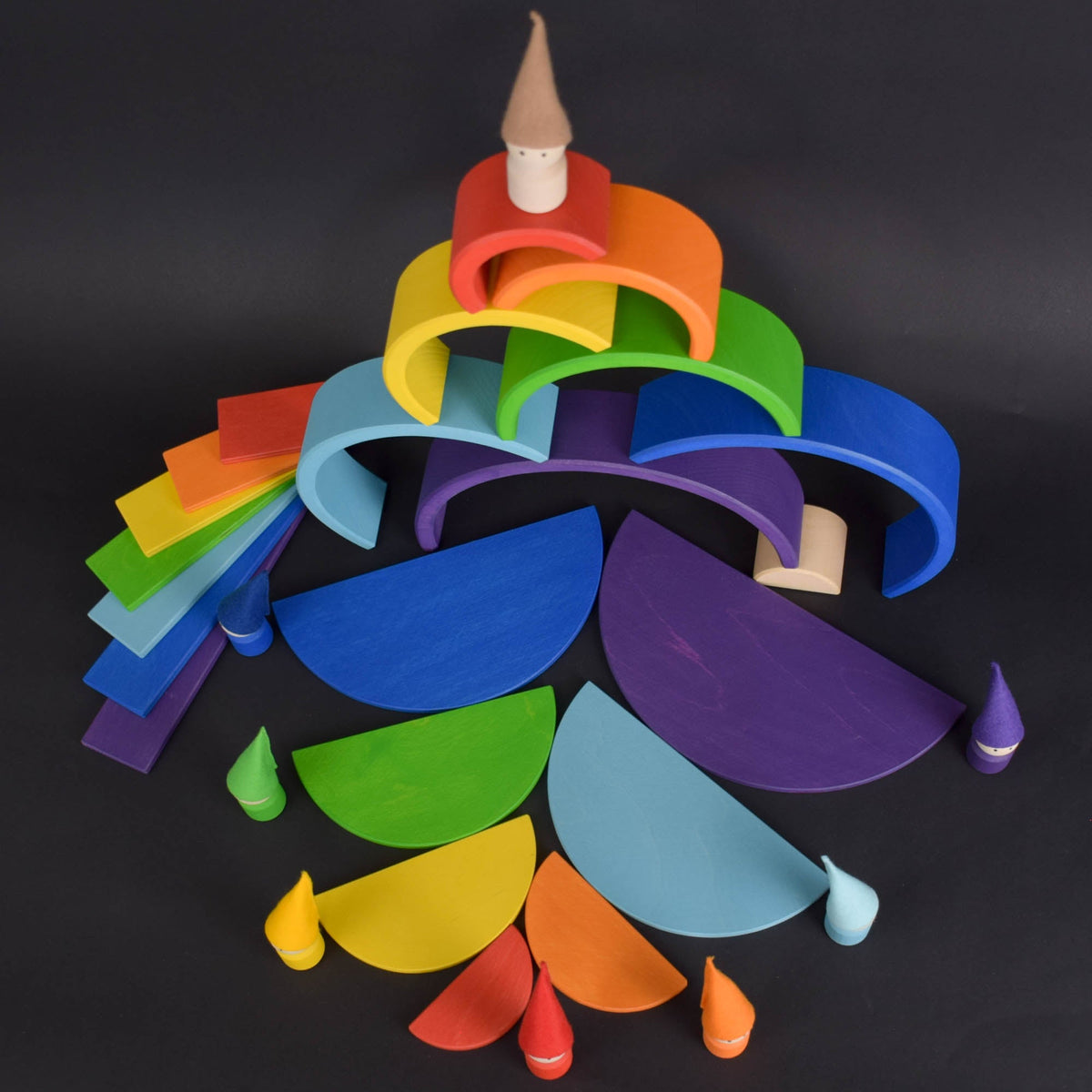 Handmade Montessori rainbow building toy in linden wood and plywood with a natural wax-and-oil finish