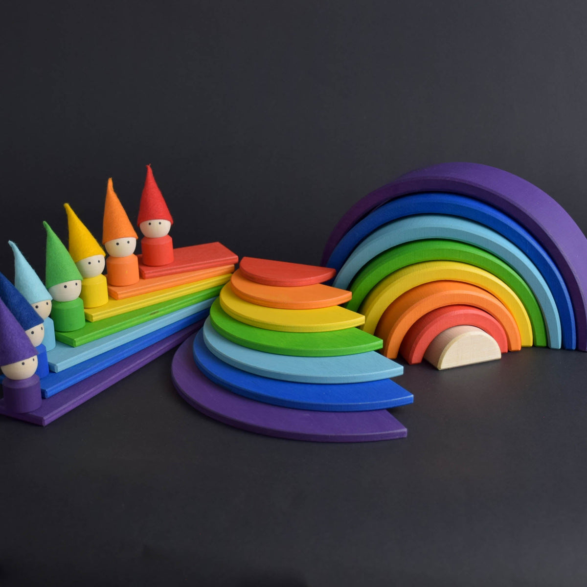 Handmade Montessori rainbow building toy in linden wood and plywood with a natural wax-and-oil finish