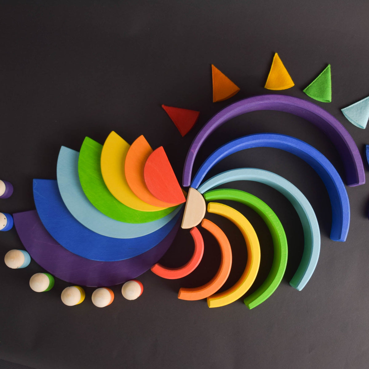 Handmade Montessori rainbow building toy in linden wood and plywood with a natural wax-and-oil finish
