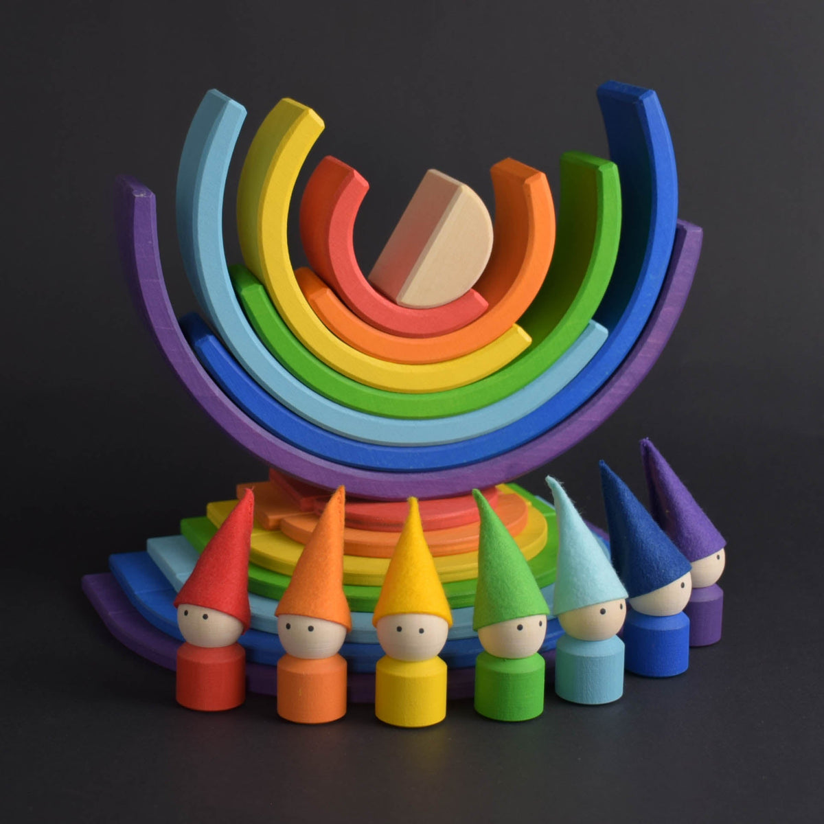 Handmade Montessori rainbow building toy in linden wood and plywood with a natural wax-and-oil finish