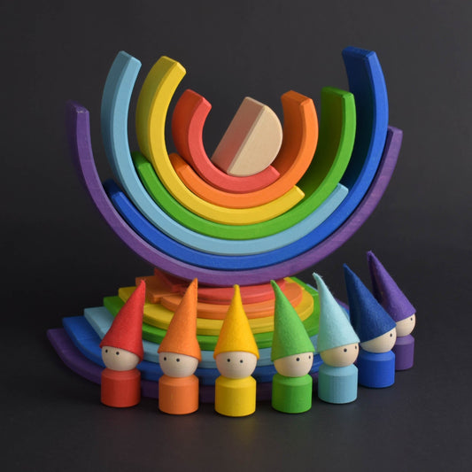Handmade Montessori rainbow building toy in linden wood and plywood with a natural wax-and-oil finish