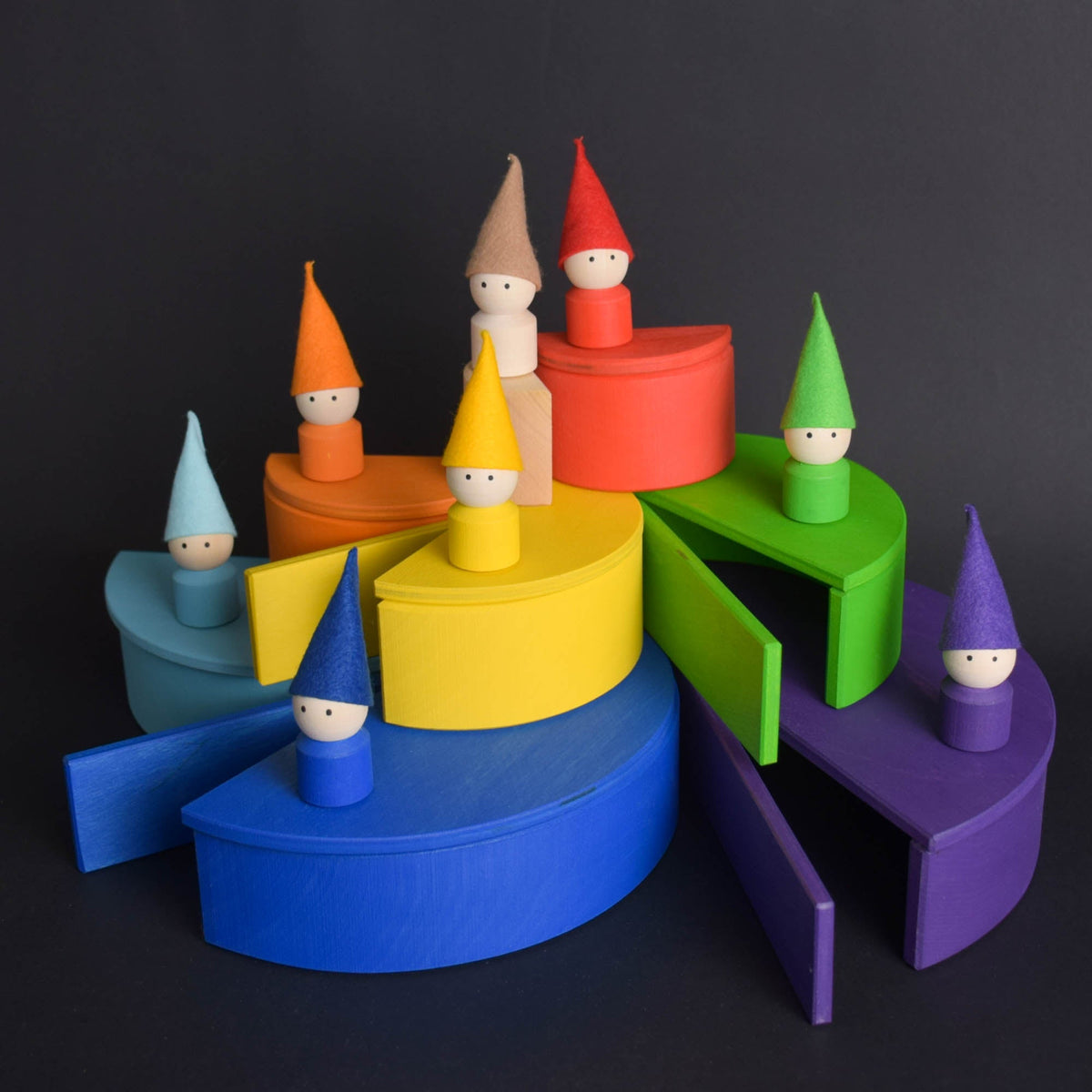 Handmade Montessori rainbow building toy in linden wood and plywood with a natural wax-and-oil finish