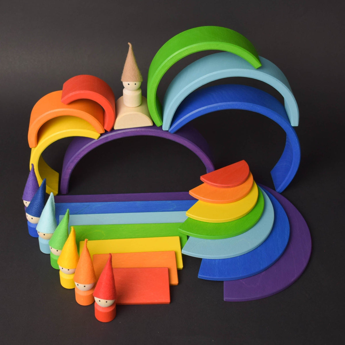 Handmade Montessori rainbow building toy in linden wood and plywood with a natural wax-and-oil finish