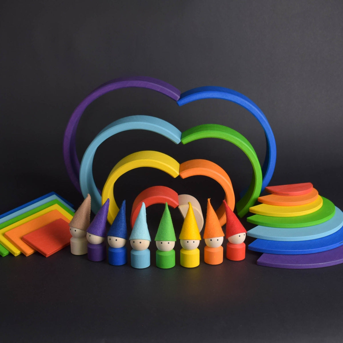 Handmade Montessori rainbow building toy in linden wood and plywood with a natural wax-and-oil finish