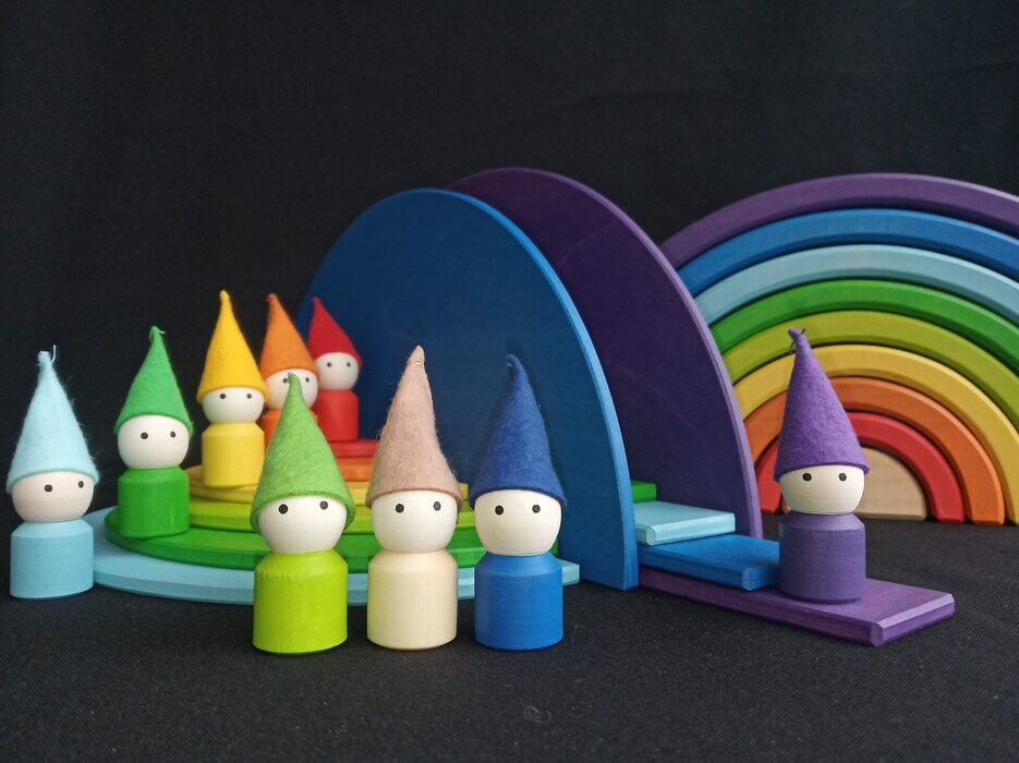 Handmade Montessori rainbow building toy in linden wood and plywood with a natural wax-and-oil finish