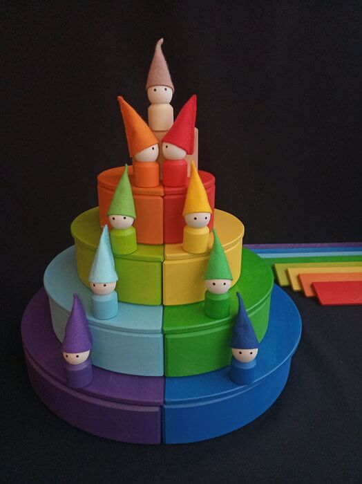 Handmade Montessori rainbow building toy in linden wood and plywood with a natural wax-and-oil finish