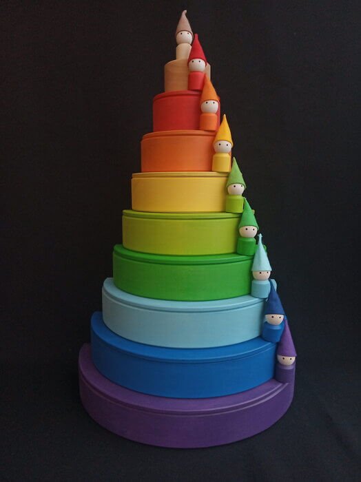 Handmade Montessori rainbow building toy in linden wood and plywood with a natural wax-and-oil finish