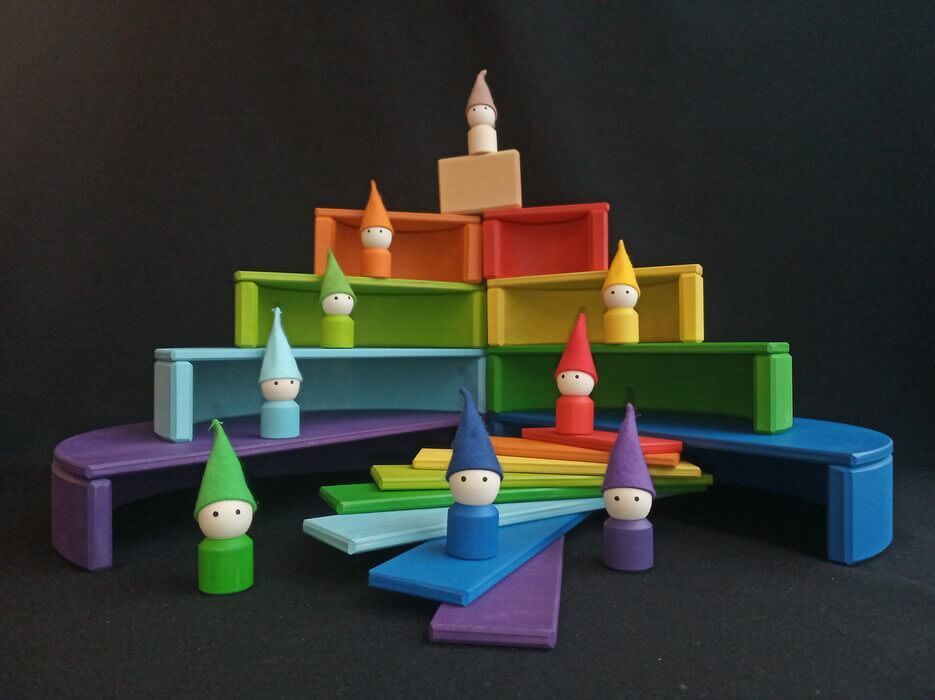 Handmade Montessori rainbow building toy in linden wood and plywood with a natural wax-and-oil finish