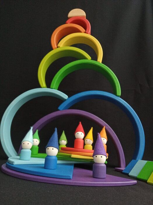 Handmade Montessori rainbow building toy in linden wood and plywood with a natural wax-and-oil finish
