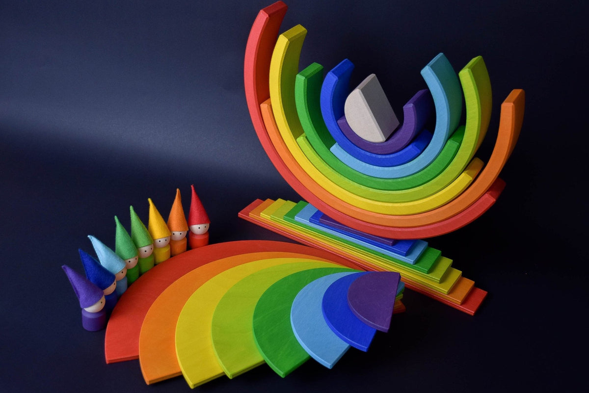 Handmade Montessori rainbow building toy in linden wood and plywood with a natural wax-and-oil finish