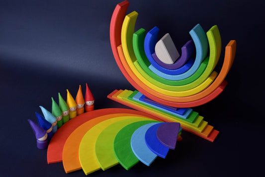 Handmade Montessori rainbow building toy in linden wood and plywood with a natural wax-and-oil finish