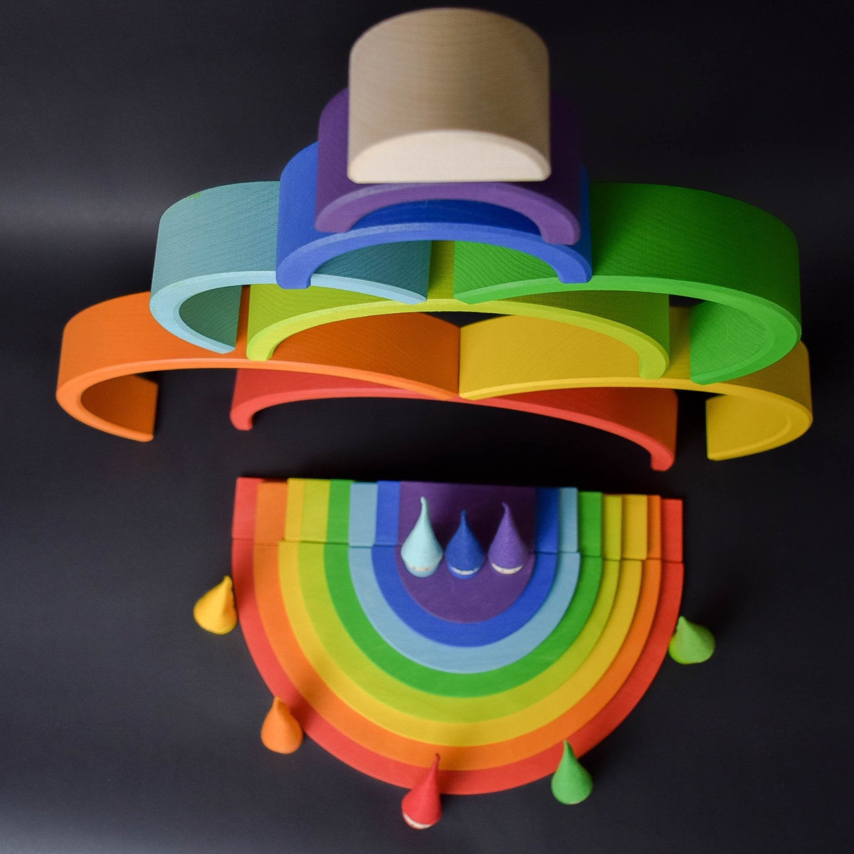 Handmade Montessori rainbow building toy in linden wood and plywood with a natural wax-and-oil finish