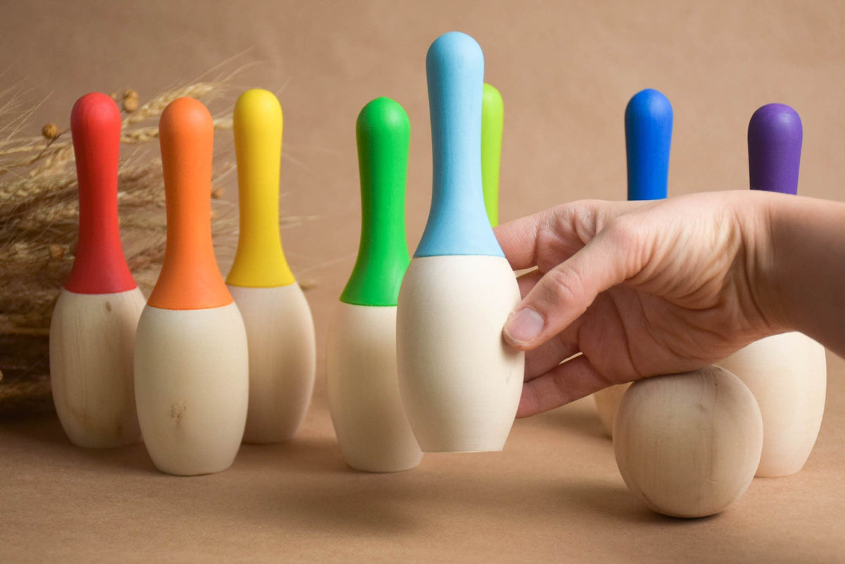 Wooden mini bowling game in rainbow colors
