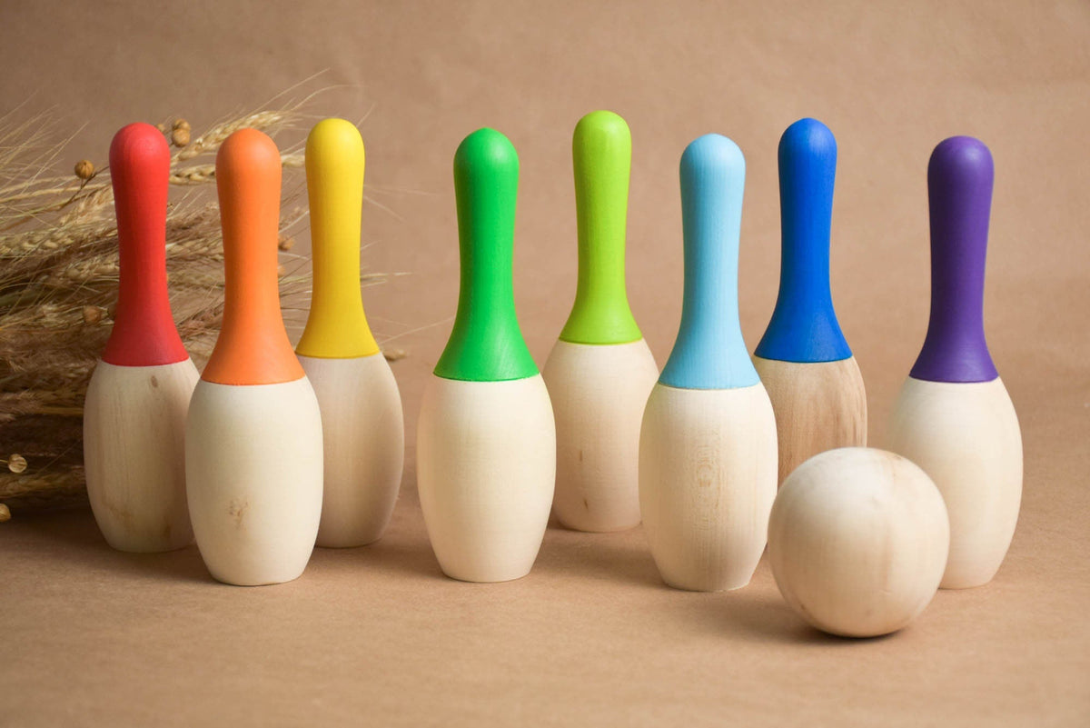 Mini bowling game with colorful wooden pins