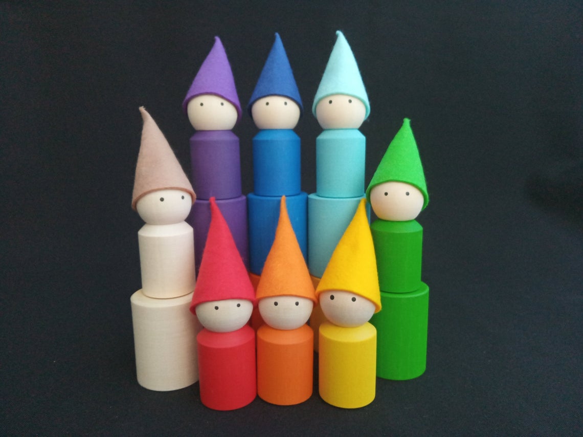Rainbow wooden peg dolls with hats and cups