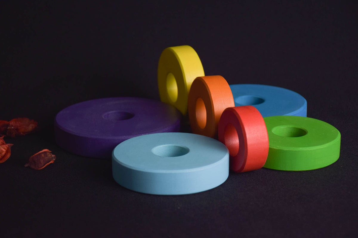 Linden wood stacking rings toy with rainbow-colored rings