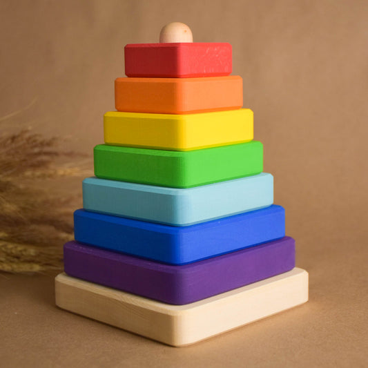 Linden wood stacking toy with square rings