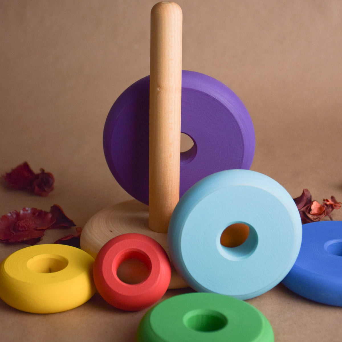 Wooden ring stacker with turned rings