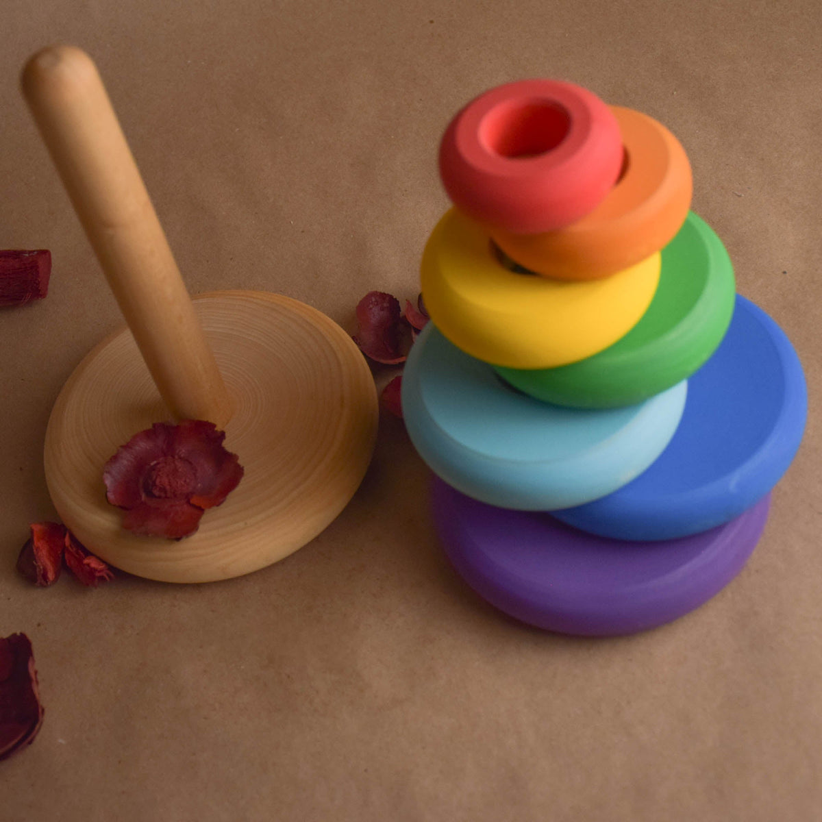Wooden stacking toy with turned rings