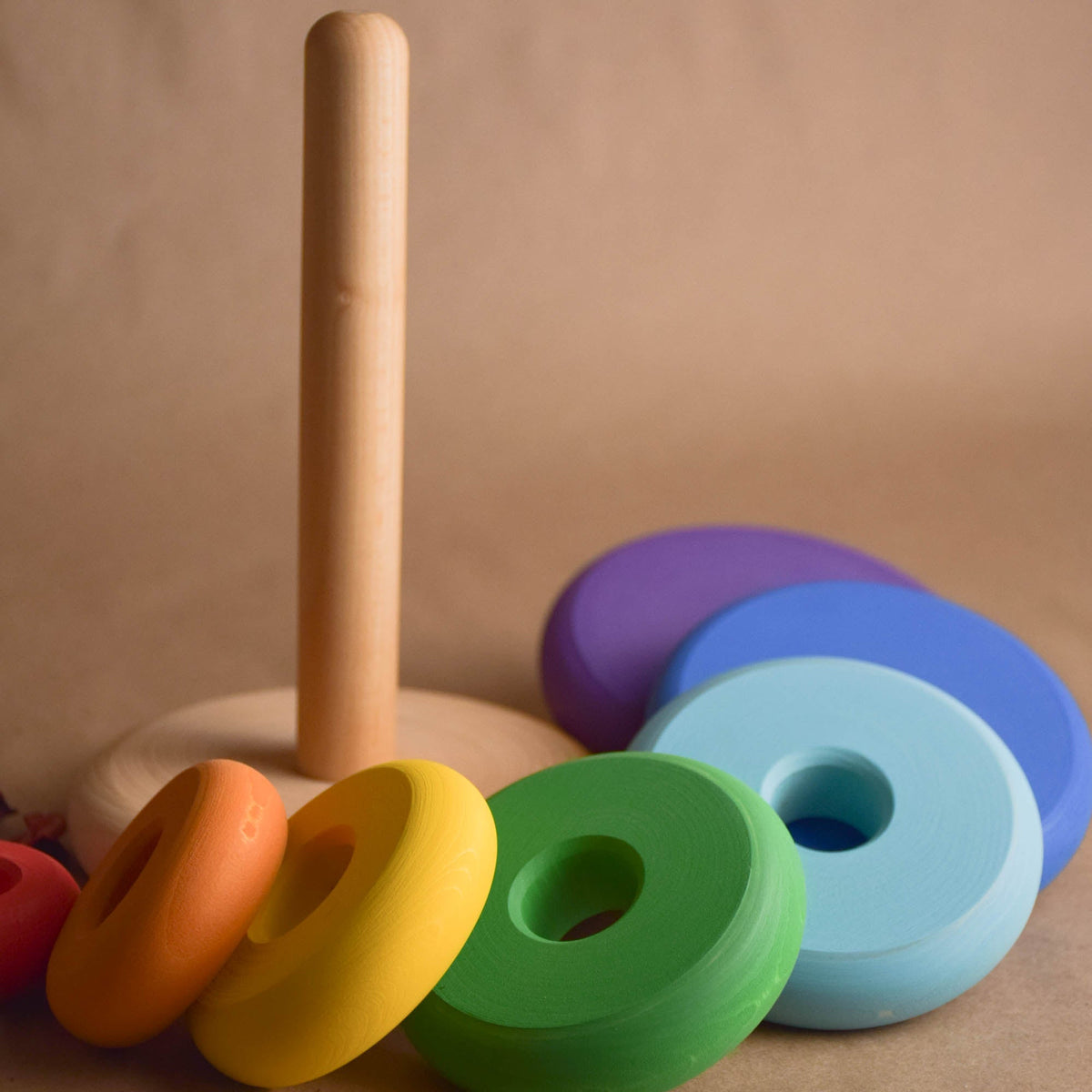 Stacking toy with turned rings made from wood