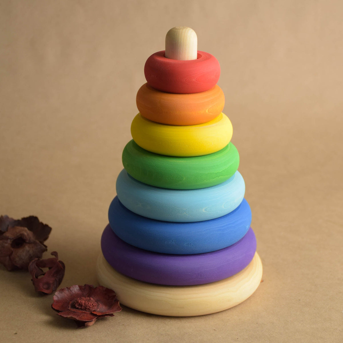 Stacking toy with turned rings made from wood