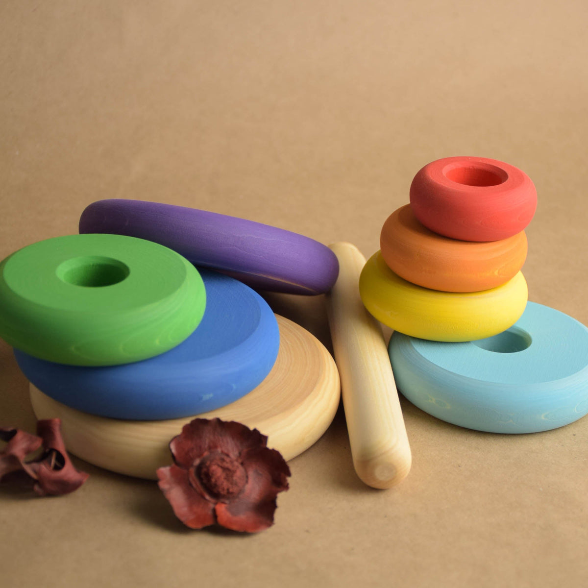 Wooden ring stacker with turned rings