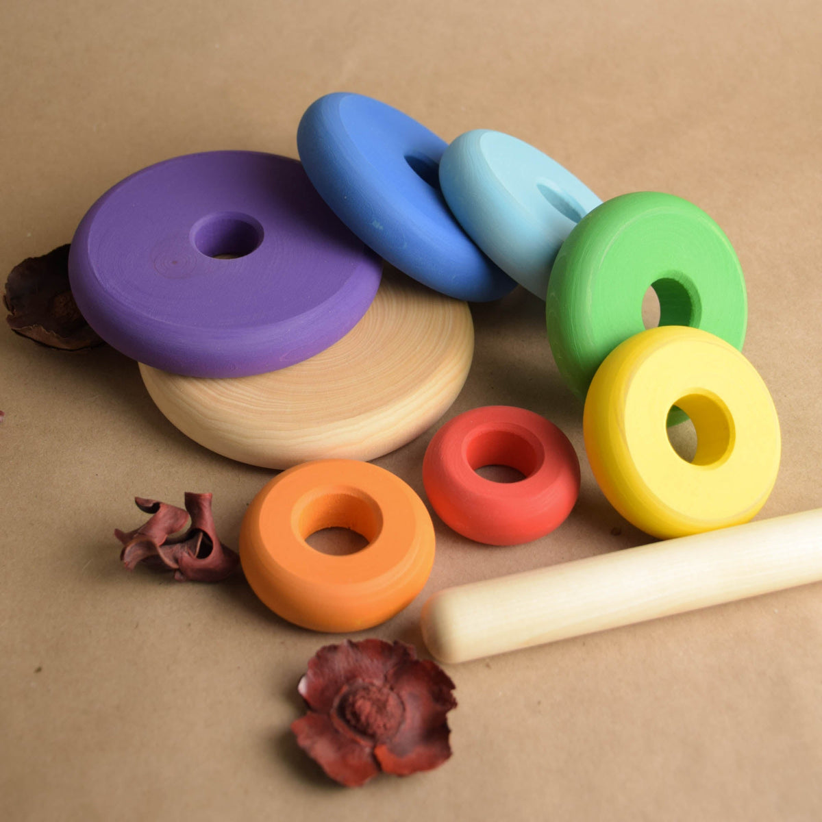 Wooden ring stacker with turned rings
