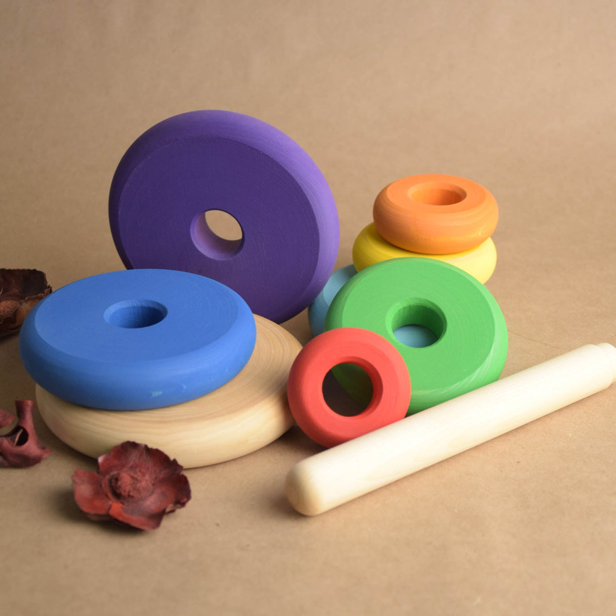 Wooden stacking toy with turned rings