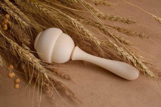 Rose wooden maraca baby rattle made from linden wood