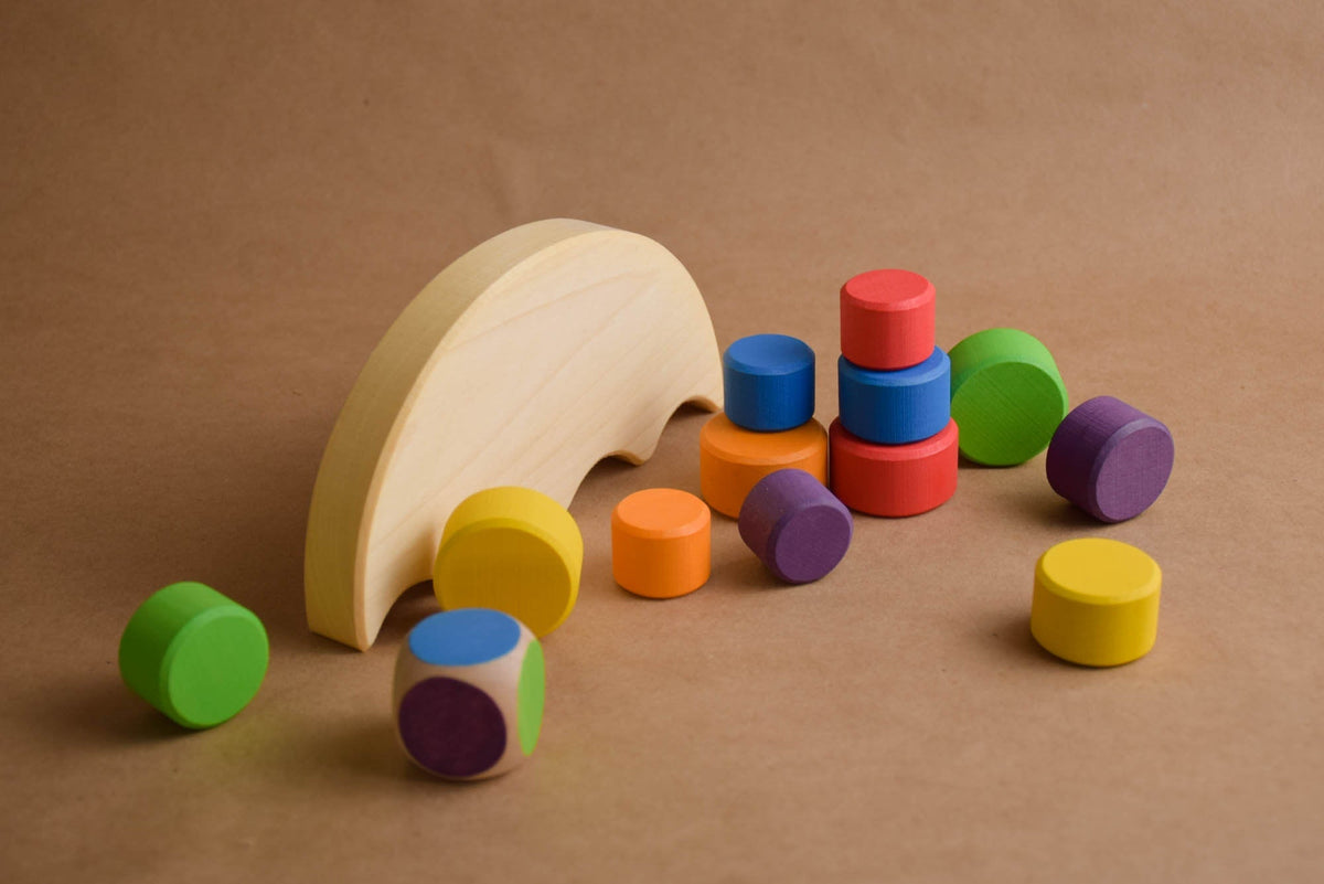 Semicircle with cylinders in a variety of colors.
