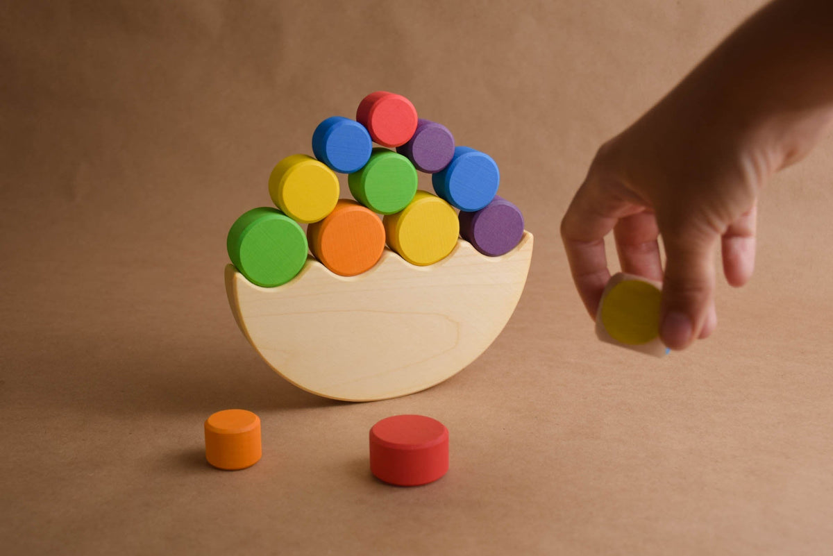 Multicolored cylinders with a semicircle.
