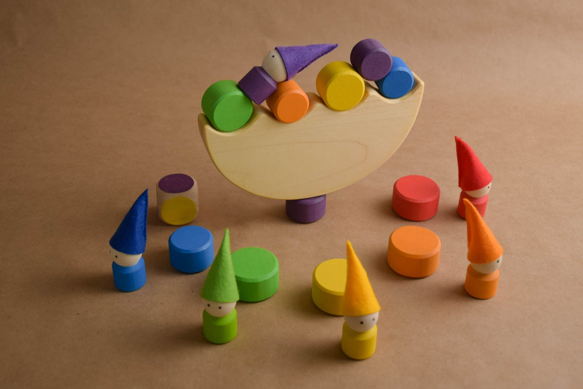 Cylinders in different colors with a semicircle.