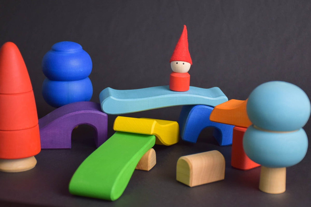 Handmade Montessori house-shaped nesting toy in linden wood with a natural colored wax finish