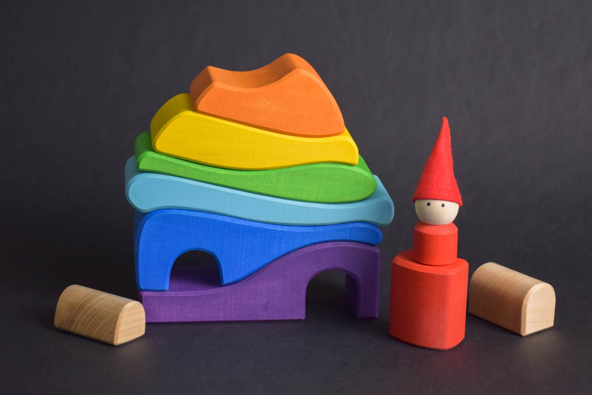 Handmade Montessori house-shaped nesting toy in linden wood with a natural colored wax finish