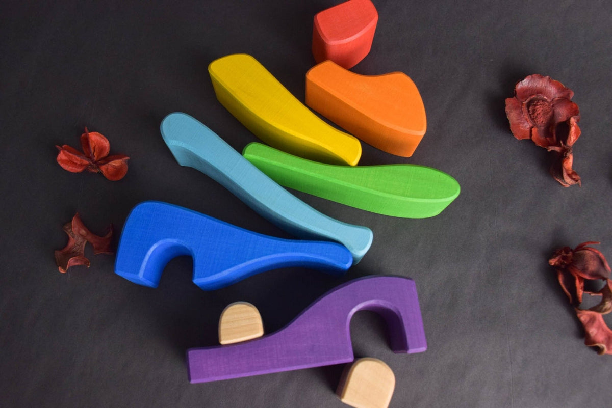 Handmade Montessori house-shaped nesting toy in linden wood with a natural colored wax finish