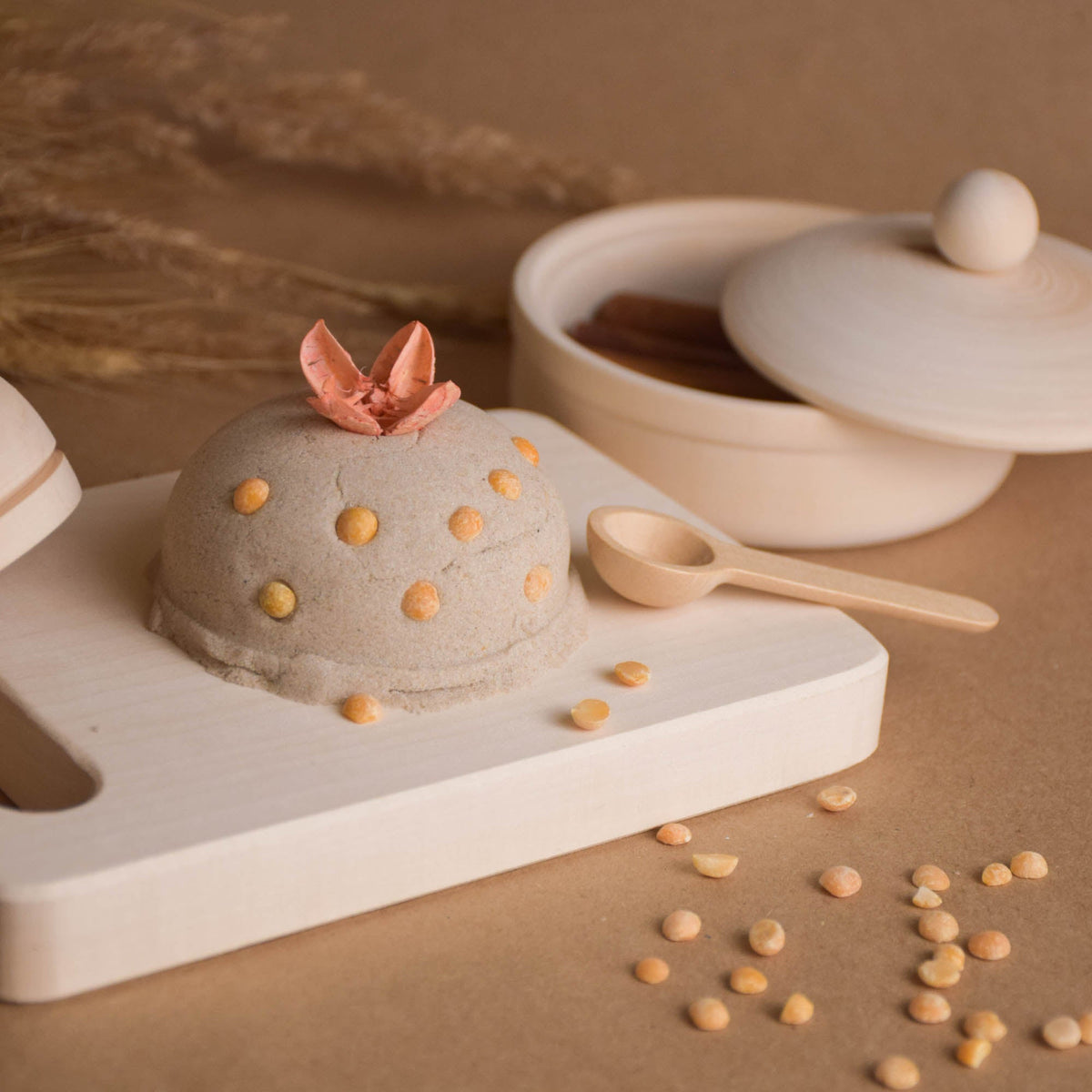 Handmade natural wooden play dishes for Montessori-inspired play, crafted from solid wood